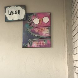 Stay Glazed Donuts & Cafe - Fun little guy on the wall