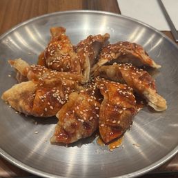 yangnyeum mandu (spicy pork dumplings) yangnyeum mandu (spicy pork dumplings)