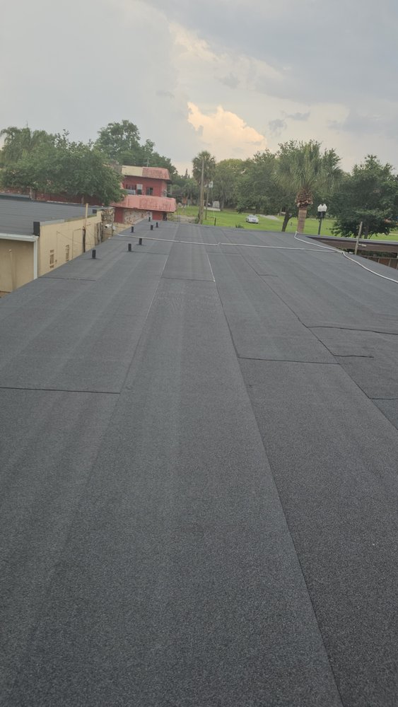 Slide of Osmin Roofing