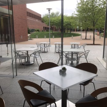 Cafe Tempo - A glass partition separates the outside dining area from the inside dining area.  So beautiful! - Salad Near Me - Overland Park, Kansas