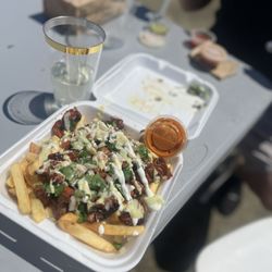 Benicia Waterfront Festival - HELLA Fries. Was the name of the dish. With Filipino candied chicken