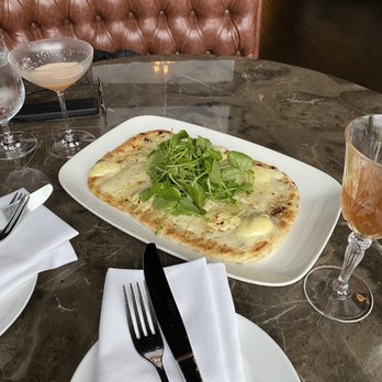 Whiskey by John Howie - Cheese, truffle and watercress flatbread - Whiskey Bars Near Me - Bellevue, Washington Whiskey by John Howie - Cheese, truffle and watercress flatbread - Whiskey Bars Near Me - Bellevue, Washington