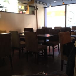 a table and chairs in a restaurant
