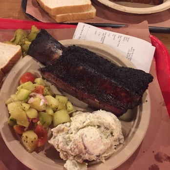 Stiles Switch BBQ & Brew - Beef Rib plate with potato salad and tomato cucumber salad. - Barbeque Near Me - Austin, Texas Stiles Switch BBQ & Brew - Beef Rib plate with potato salad and tomato cucumber salad. - Barbeque Near Me - Austin, Texas