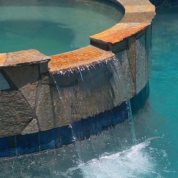 Sunset Pool Company - After, new stone and tile on spa - Pool & Hot Tub Service Near Me