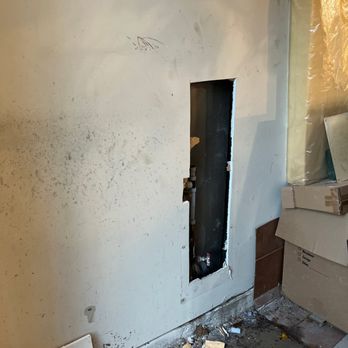 Texas Star Plumbers - Hole cut in the garage wall. - Plumbing Near Me - Magnolia, Texas Texas Star Plumbers - Hole cut in the garage wall. - Plumbing Near Me - Magnolia, Texas