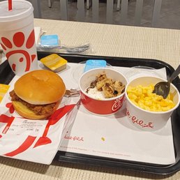 My meal chicken sandwich no pickles three nuggets grilled mac and cheese Coke Zero. Honey mustard sauce for the chicken sandwich.