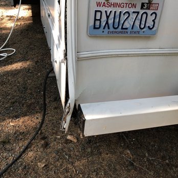 Evolved Off Grid - Whoops! Backed I to a low stump. - RV Repair Near Me - Lynnwood, Washington Evolved Off Grid - Whoops! Backed I to a low stump. - RV Repair Near Me - Lynnwood, Washington