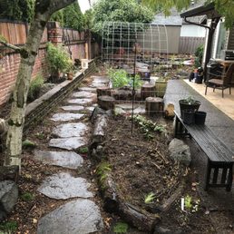 Completed project after planting. Excited for all our new plants to mature and fill everything in!