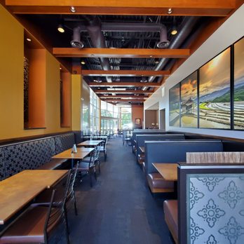 Sy Thai - an empty restaurant with tables and booths - Thai Near Me - Troy, Michigan Sy Thai - an empty restaurant with tables and booths - Thai Near Me - Troy, Michigan