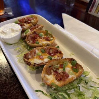 Overtime Sports Pub - Loaded Potato Skins - Sports Bars Near Me - Raleigh, North Carolina Overtime Sports Pub - Loaded Potato Skins - Sports Bars Near Me - Raleigh, North Carolina