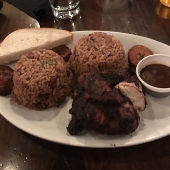 Ja' Grill Hyde Park - 1/4 white jerk chicken dinner which comes with 2 sides (I opted for double rice & beans) plantains bread & spicy jerk bbq sauce on the side. - Lounges Near Me - Chicago, Illinois