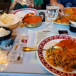Perfect pairs Naan and Paneer Makhani, Biryani and raitha.