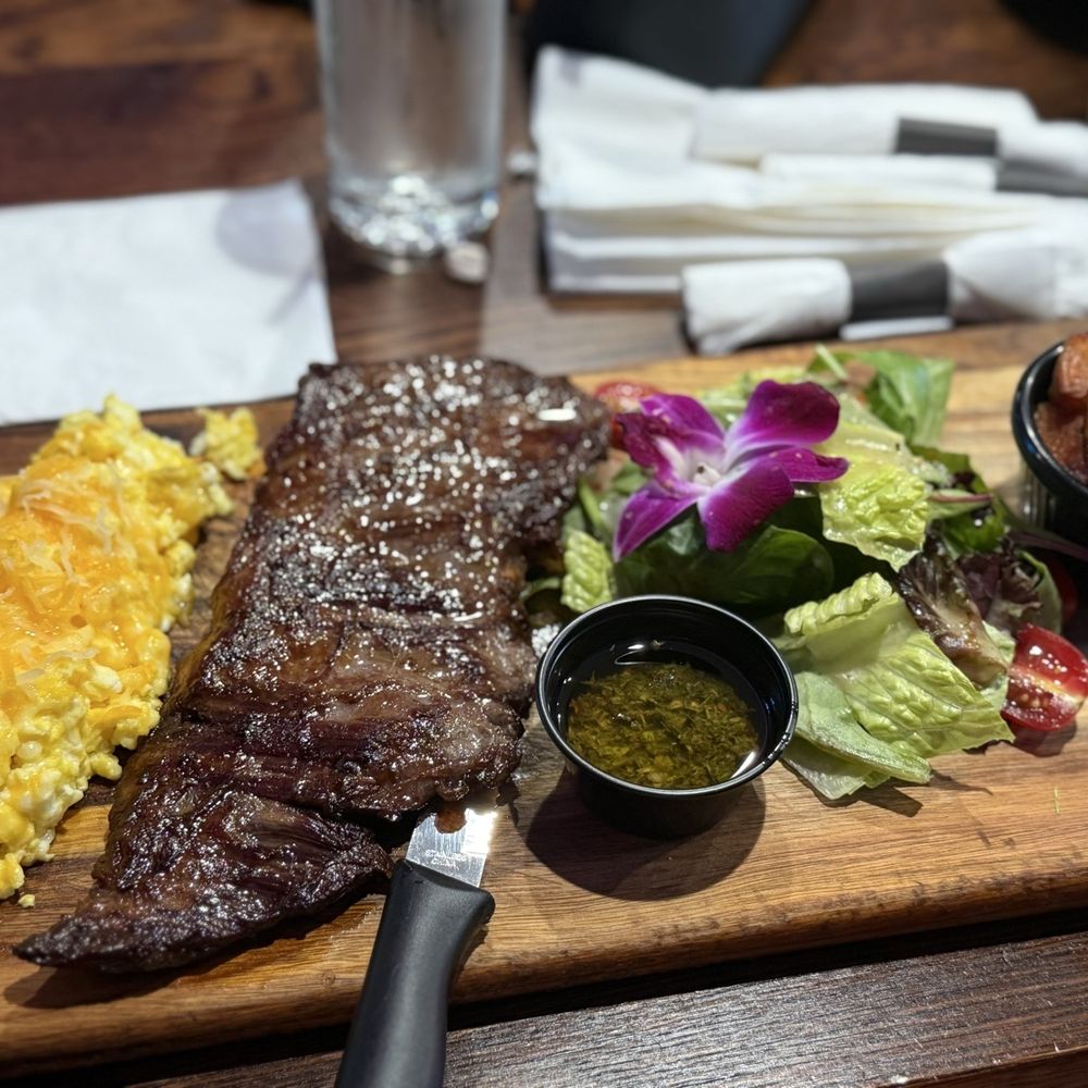 The Garden Bar And Grill - Steak, scrambled eggs with cheddar cheese, side salad, and home fries - Latin American Near Me - Brooklyn, New York The Garden Bar And Grill - Steak, scrambled eggs with cheddar cheese, side salad, and home fries - Latin American Near Me - Brooklyn, New York