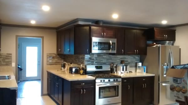 Kitchen Remodel - This remodel was done on an old kitchen that was in bad shape, the rest of the house has been remodeled, so the kitchen stuck out like a sore thumb, we provided the correct circuits for their appliances and added some recessed lighting, the owner loves cooking in their new kitchen now and they could run all their appliances without tripping any breakers. Kitchen Remodel - This remodel was done on an old kitchen that was in bad shape, the rest of the house has been remodeled, so the kitchen stuck out like a sore thumb, we provided the correct circuits for their appliances and added some recessed lighting, the owner loves cooking in their new kitchen now and they could run all their appliances without tripping any breakers.