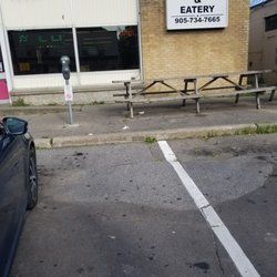 Cool Licks Ice Cream Parlour - Paid parking meters for your paying customers? This is crap-tacular Welland, not Toronto!!!