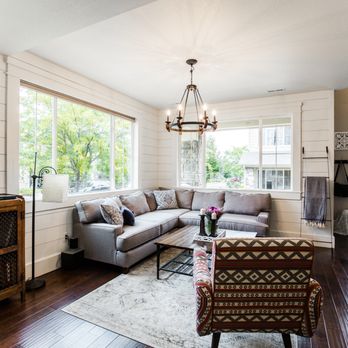 Living Stones Remodeling - a living room with wood floors - Flooring Near Me Living Stones Remodeling - a living room with wood floors - Flooring Near Me