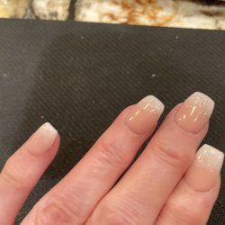Crystal Nails - Ombré dip with sparkle on nail tips.