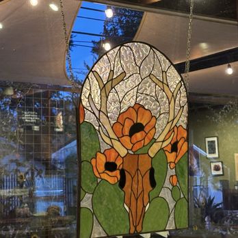 Sour Duck Market - Cute stained glass piece in front window. - Bakeries Near Me - Austin, Texas Sour Duck Market - Cute stained glass piece in front window. - Bakeries Near Me - Austin, Texas