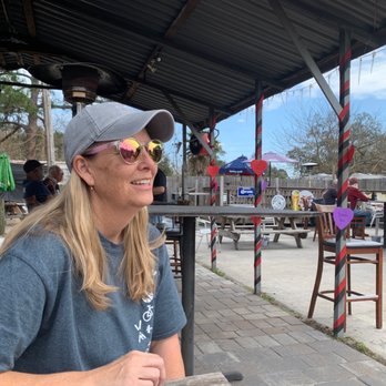 Choppers Bar & Grill - a woman sitting at a table - American Near Me - Jacksonville, Florida
