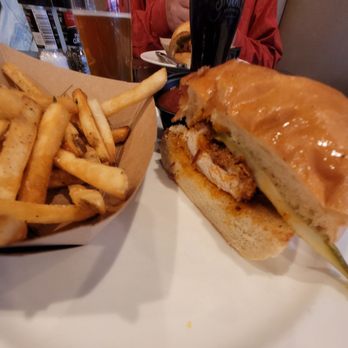 Smoke Brewing Company - Half of a Nashville Chicken sandwich - Bars Near Me - Lee's Summit, Missouri Smoke Brewing Company - Half of a Nashville Chicken sandwich - Bars Near Me - Lee's Summit, Missouri