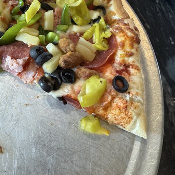 Garbonzo's Pizza - Part of our Everything pizza-- minus mushrooms and onions, add pepperoncini! - Pizza Near Me - Caldwell, Idaho