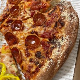 a slice of pepperoni pizza a slice of pepperoni pizza