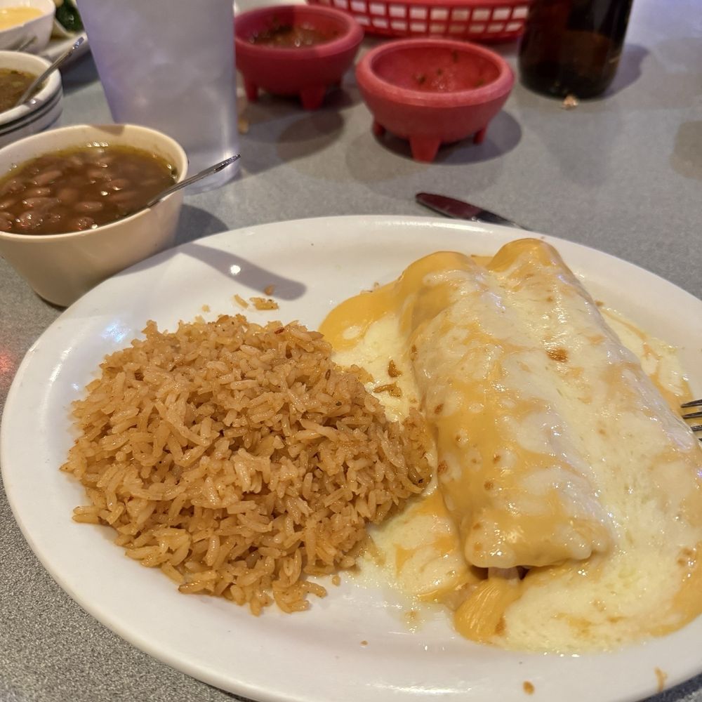 5. Enchiladas shredded chicken with queso sauce , rice and charro beans. 5. Enchiladas shredded chicken with queso sauce , rice and charro beans.