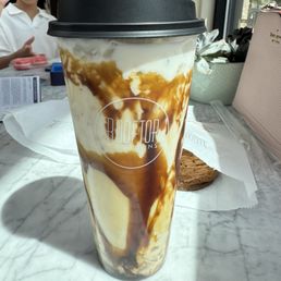 Brown sugar milk tea with lychee jelly