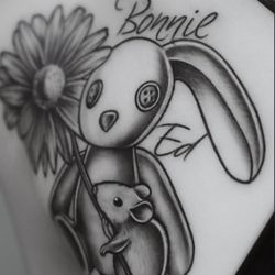 Whimsical personalized bunny rabbit memorial piece featuring two cartoon-style rabbits with text "Bonnie" above.
