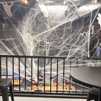 Rotator Taproom - a web of spider webs hanging from the ceiling - Pubs Near Me - Walnut Creek, California Rotator Taproom - a web of spider webs hanging from the ceiling - Pubs Near Me - Walnut Creek, California