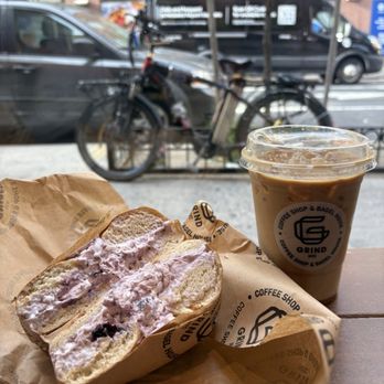 Grind NYC - Blueberry cream cheese on a plain bagel with a salted caramel coffee - Cafes Near Me - New York, New York