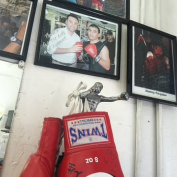 Vanega's Barber Shop - Antonio Margarito signed gloves. PacMan signed portrait and oscar de la hoya with local talent - Hair Salons Near Me - Los Angeles, California Vanega's Barber Shop - Antonio Margarito signed gloves. PacMan signed portrait and oscar de la hoya with local talent - Hair Salons Near Me - Los Angeles, California
