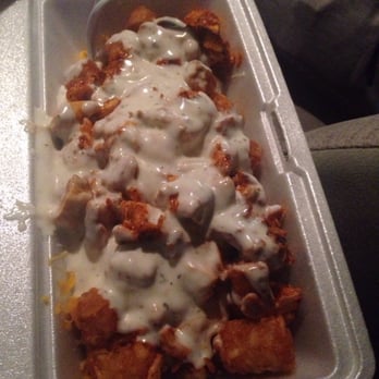 IV Deli Mart - The devil (buffalo chicken cheese tots) - Delis Near Me - Goleta, California