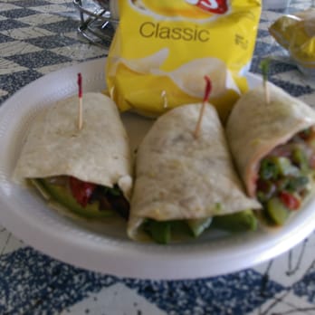 Reba's - Sundance wrap, added avocado and swapped ranch out with a raspberry vinaigrette! - Pizza Near Me - Giddings, Texas Reba's - Sundance wrap, added avocado and swapped ranch out with a raspberry vinaigrette! - Pizza Near Me - Giddings, Texas