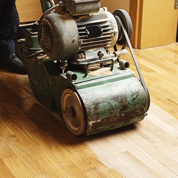 CT Floor Supply - a man standing next to a machine on a hard wood floor - Flooring Near Me - Wilton, Connecticut CT Floor Supply - a man standing next to a machine on a hard wood floor - Flooring Near Me - Wilton, Connecticut
