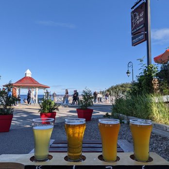Microbrasserie Tadoussac - beer glasses on a table - Brewpubs Near Me - Tadoussac, Quebec Microbrasserie Tadoussac - beer glasses on a table - Brewpubs Near Me - Tadoussac, Quebec