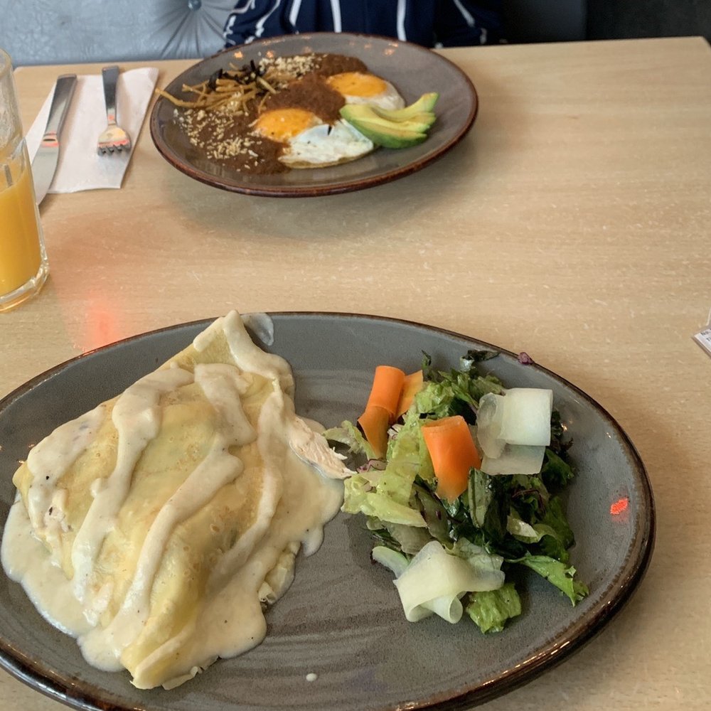 Huevos rancheros and chicken crepe with mushroom Huevos rancheros and chicken crepe with mushroom