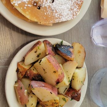 Millie's Cafe - Pasadena - Chocolate Chip Pancake (short stack) with a side of potatoes - Breakfast & Brunch Near Me - Pasadena, California