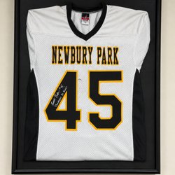 Advanced Sports Chiropractic - Signed jersey from a local football player displayed at Advanced Sports Chiropractic