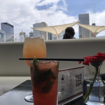 IO Godfrey - Strawberry + blueberry mojito and mango prosecco with CBD added - Cocktail Bars Near Me - Chicago, Illinois IO Godfrey - Strawberry + blueberry mojito and mango prosecco with CBD added - Cocktail Bars Near Me - Chicago, Illinois