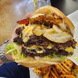 Cal's Fried Chicken & Burgers - Berserk Burger w/seasoned waffle fries! This thing was massive! 