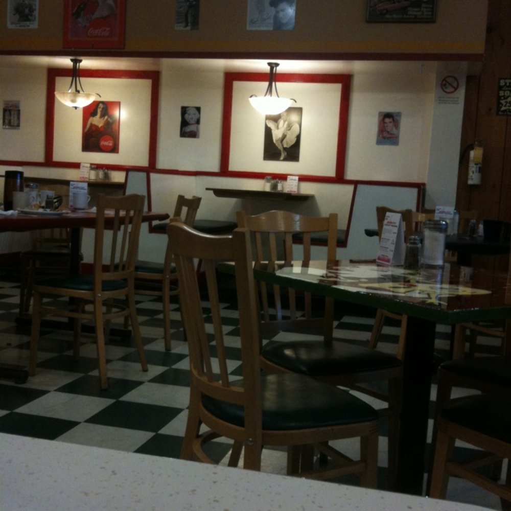 Spinners Diner - tables and chairs in a restaurant - Diners Near Me - Cornwall, Ontario Spinners Diner - tables and chairs in a restaurant - Diners Near Me - Cornwall, Ontario