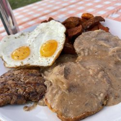 Pocono Organics - Biscuits and Mushroom Gravy with a side of eggs and sausage.