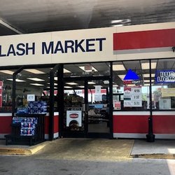 Flash Market - view of one of the two entrances to the convenience store building