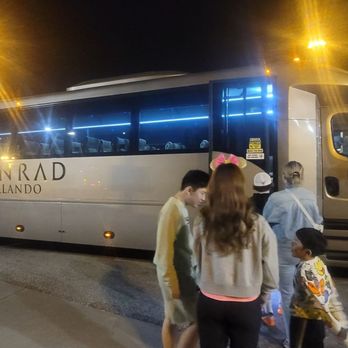 Conrad Orlando at Evermore - Shuttle bus which transports back and from the hotel to all the Disney Parks several times during the day. - Hotels Near Me - Orlando, Florida Conrad Orlando at Evermore - Shuttle bus which transports back and from the hotel to all the Disney Parks several times during the day. - Hotels Near Me - Orlando, Florida