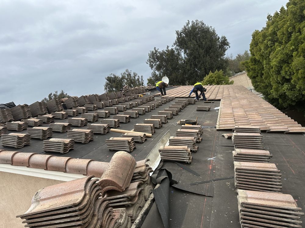 Slide of OMC Roofing