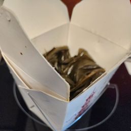 Lau lau In a Chinese takeout box Lau lau In a Chinese takeout box