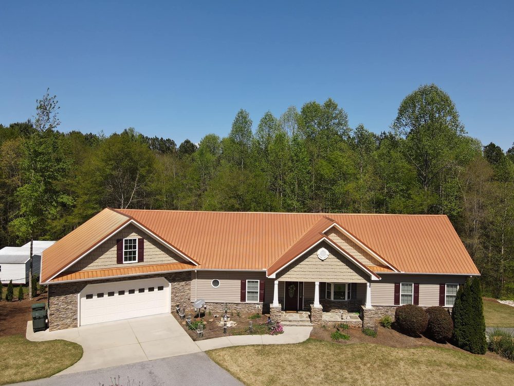 Slide of Anderson Metal Roofing and Shingles