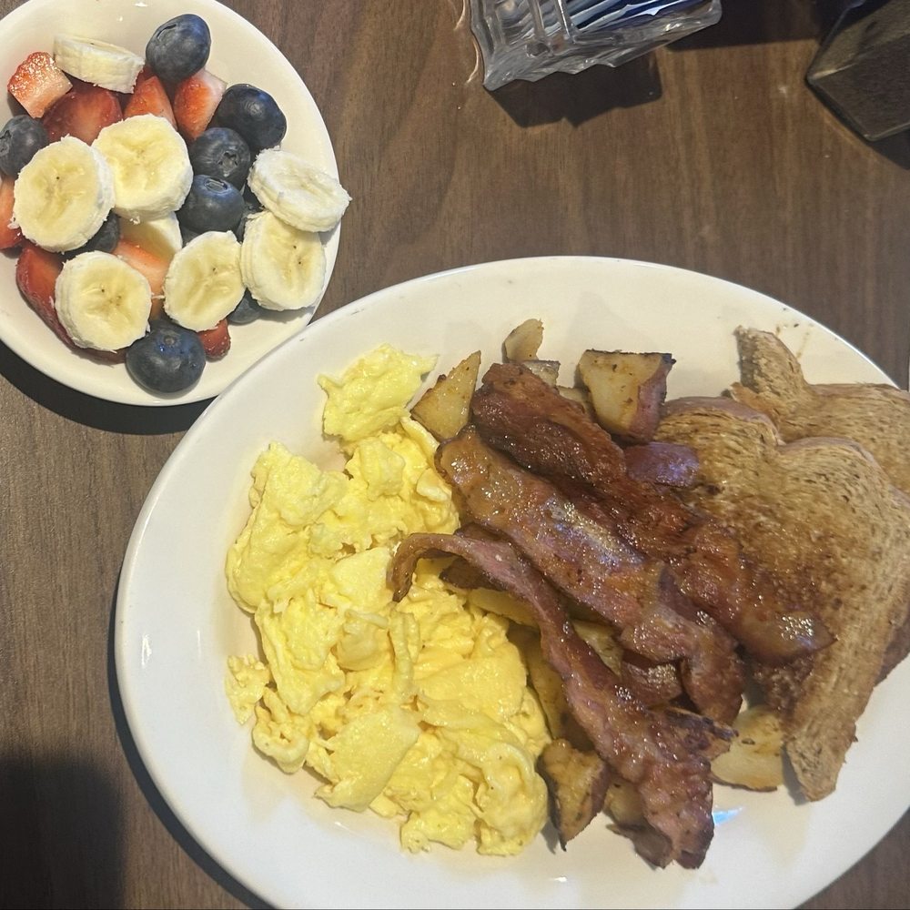 The Wooden Spoon - 2 eggs, toast ($7.49) side of bacon ($3.99) and a side of fresh fruit ($1.50) - Breakfast & Brunch Near Me - Ossipee, New Hampshire The Wooden Spoon - 2 eggs, toast ($7.49) side of bacon ($3.99) and a side of fresh fruit ($1.50) - Breakfast & Brunch Near Me - Ossipee, New Hampshire